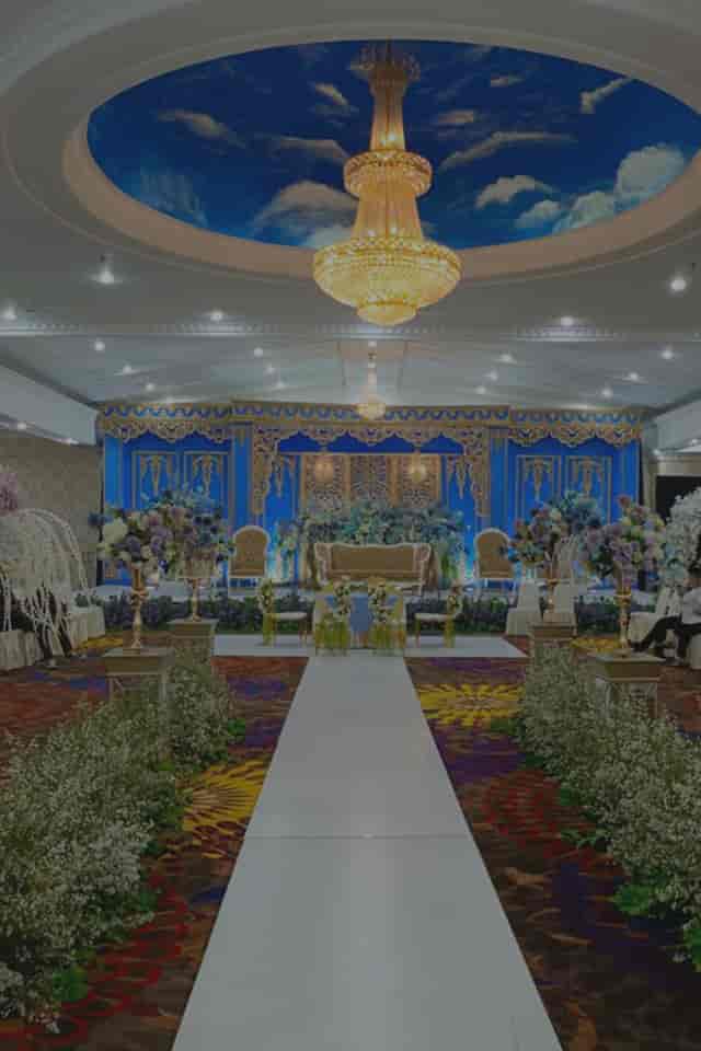 Palma One Grand Ballroom wedding stage with blue and gold backdrop for elegant event decor.