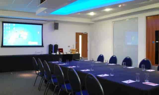 Boardroom at M Shed Bristol with AV screen, ideal for corporate meetings and team presentations.