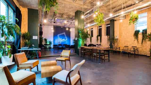 Industrial-chic 21Soho cocktail bar for networking events and creative workshops.