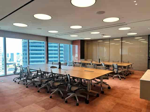 Modern boardroom with city views at Ocean Financial Centre for executive meetings and conferences.