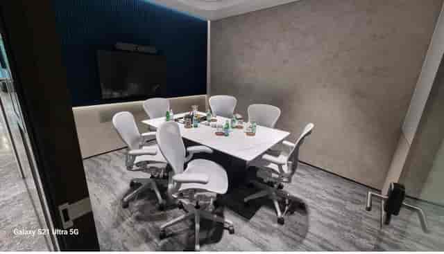 Modern Capital Square meeting room with ergonomic seating for hybrid collaboration and AV setup.