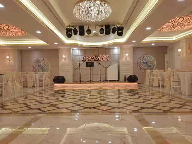 Teras Labella banquet hall with stage, ideal for corporate awards dinner and gala events.