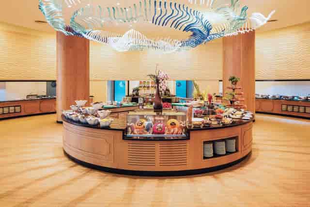Circular buffet station at Pacific Main Saloon, luxury conference event space.