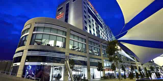 Modern Crowne Plaza Istanbul Asia conference center with glass meeting space for corporate events.