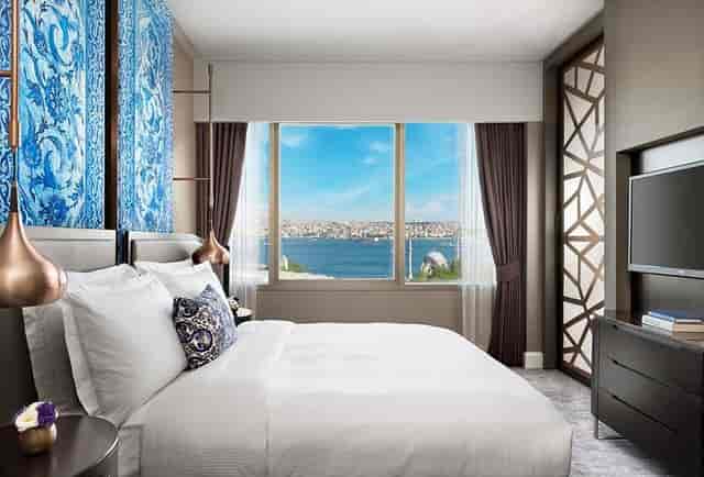 Luxury Ritz-Carlton Istanbul suite with Bosphorus view for executive retreats and VIP events.