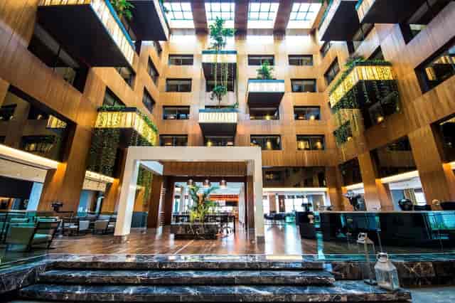 Radisson Blu Istanbul Tuzla upscale atrium lobby for hotel conference and corporate event venue.