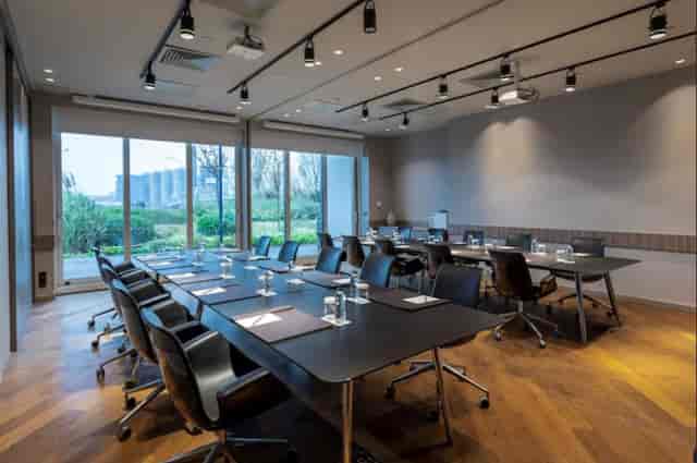 Boardroom setup with natural light at Radisson Blu Istanbul Ottomare for executive meetings.