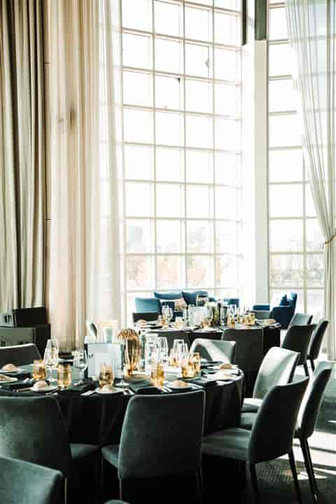 Main Space event venue with floor-to-ceiling windows for corporate receptions and gala dinners.