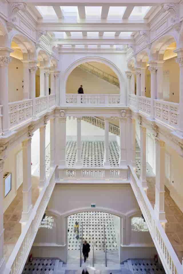 Multi-level atrium at Salt Beyoğlu: Elegant venue for high-end corporate gala and brand reception.