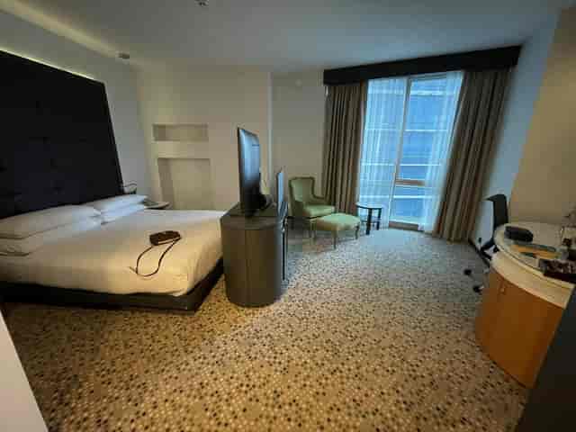 Modern hotel room with workspace at DoubleTree by Hilton Istanbul Moda for corporate events.