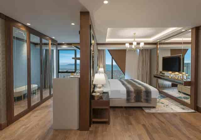 Elite World Grand Istanbul luxury suite, modern VIP hotel room for business travel and event lodging.