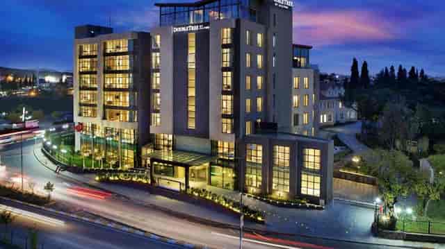 DoubleTree Tuzla conference room for corporate meetings and professional group offsites at twilight.