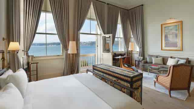 Luxury boardroom with waterfront views, ideal for executive retreats and VIP business meetings.