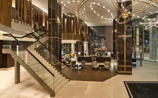 Modern Hilton Istanbul Bakirkoy hotel lobby for VIP event and networking mixer.