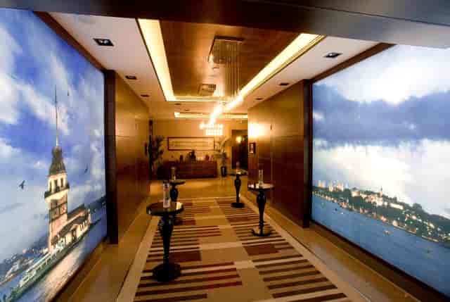 Gezi Hotel Bosphorus pre-function room with backlit murals for corporate events and networking.
