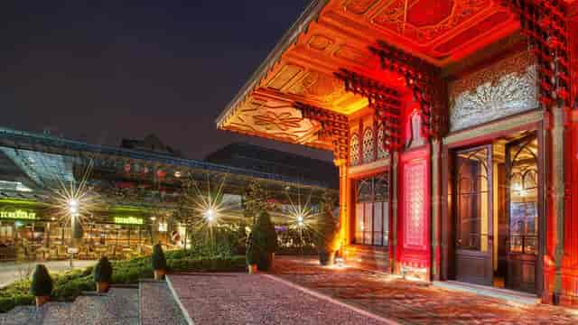 Maximum Uniq Hall outdoor event space with dramatic lighting for corporate events and galas.