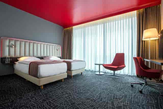 Modern twin room at Park Inn Istanbul, ideal for corporate travel and business meetings.