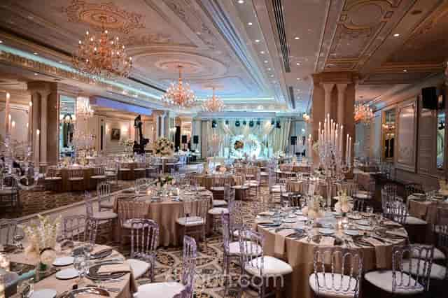 Luxury ballroom event space with crystal candelabras for elegant weddings and corporate dinners.