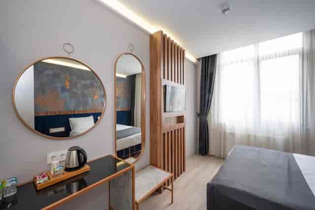 Modern hotel room at Seyithan Palace for business travel and conference lodging.