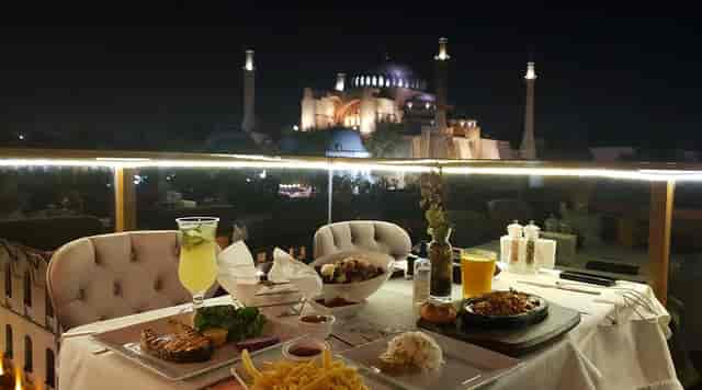 Rooftop terrace dining at 34 Restaurant, perfect for executive retreats and VIP corporate events.