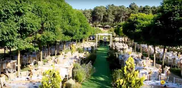Outdoor banquet garden venue at Park Lotus with symmetrical seating for weddings and events.