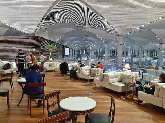 Contemporary airport lounge for professional networking and corporate event breakouts.