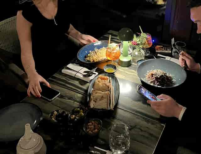 Networking event: Guests phubbing on phones at Olea Bosphorus post-conference dinner.