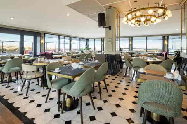 Zurich Hotel Istanbul restaurant with panoramic windows for upscale corporate networking events.