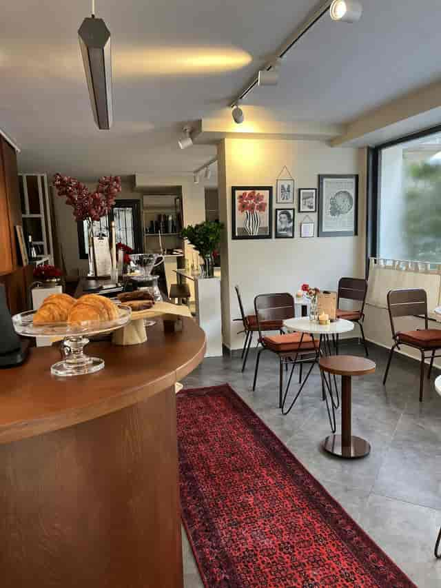Boutique breakout space with plush seating for high-end hospitality and event networking.