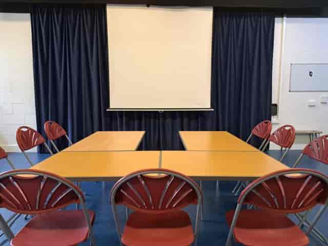 U-shape meeting setup in Brentwood Theatre auditorium for professional corporate events.