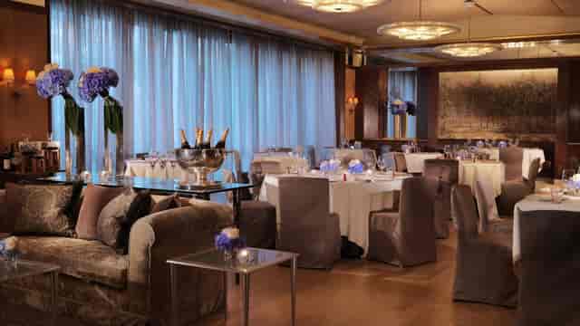 Teatro Room at Four Seasons Hotel Milano, elegant dining space for corporate gala or reception.