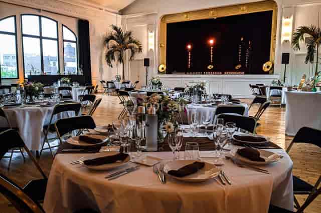 Historic Le Solaris venue set for gala dinner with monochrome decor, corporate and social event.