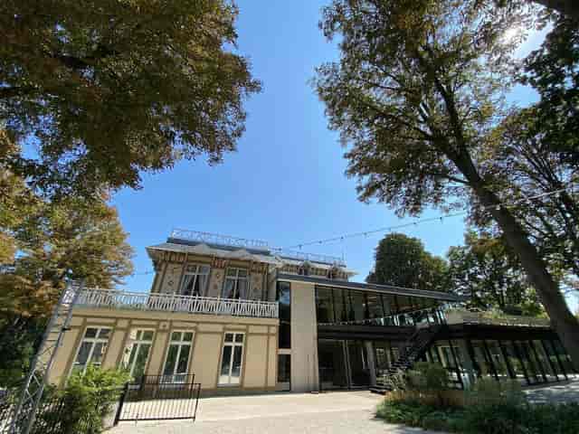 Pavillon Royal terrace with glass walls for elegant corporate galas and outdoor receptions.