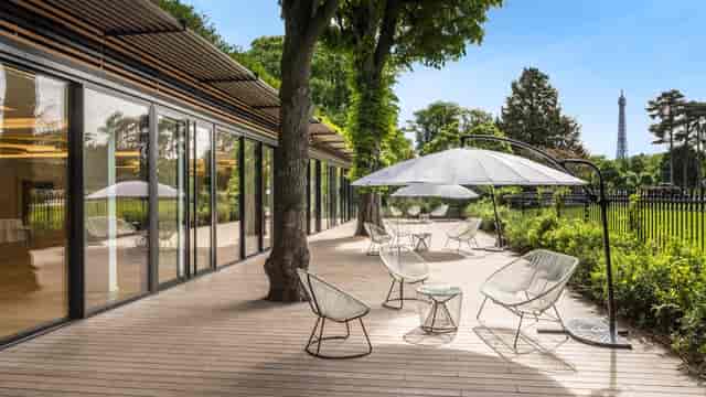 Pavillon Royal terrace with Eiffel Tower view for luxury cocktail hours and networking events.
