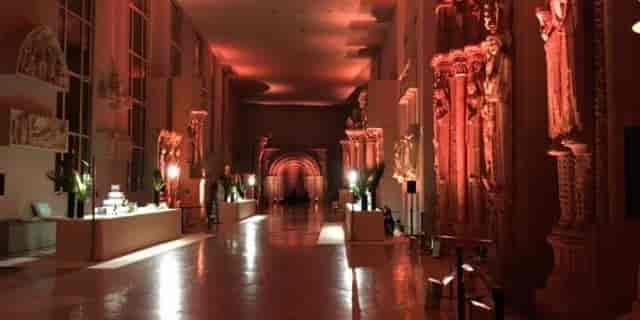 Sophisticated event space at Galerie des moulages with dramatic architectural lighting.