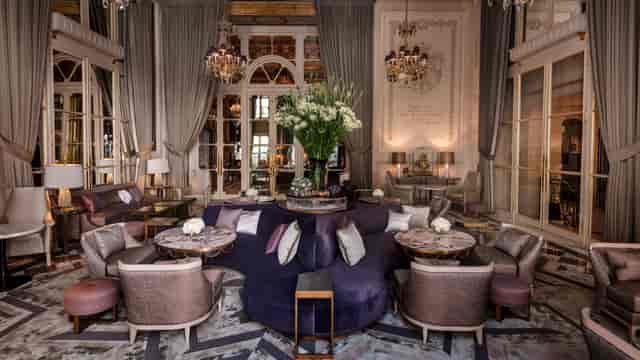 Luxury Jardin d'Hiver breakout space with circular seating for VIP networking and hospitality.
