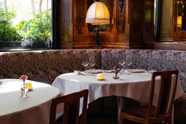 Elegant private dining room at Lucas Carton for executive business dinners and VIP events.