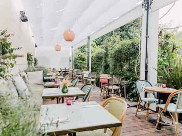 Upscale outdoor terrace in Attica for networking and corporate dinners.