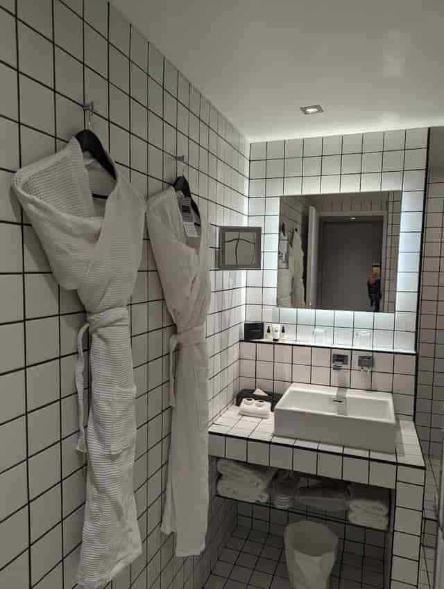 Luxury hotel bathroom suite, La Maison Champs Elysées, event accommodation, VIP room block.