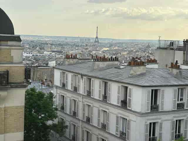 Parisian rooftop venue with Eiffel Tower view for executive receptions and incentive travel.