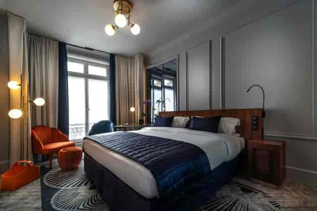 Luxury Pereire hotel suite at M Social Paris, ideal for VIP travel and executive event lodging.