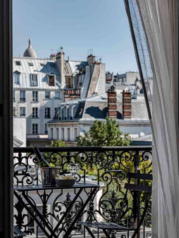 Parisian balcony suite at Grand Pigalle Experimental for luxury incentive travel and VIP networking.