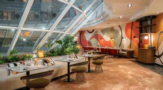 Modern cocktail bar with organic design for networking events and private dining receptions.