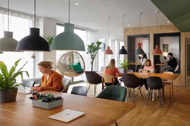 Modern Zoku Paris conference center with biophilic design for hybrid workspace and event meetings.