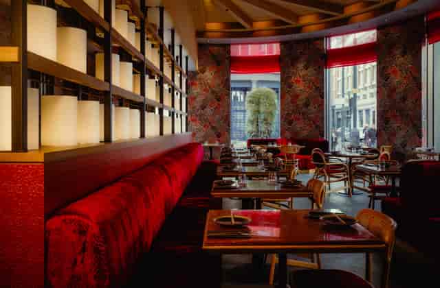 UBA Restaurant: Red interior design for high-end corporate dinners and private event hire.