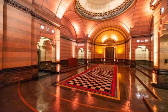 Elegant Egyptian Room with arches, ideal for upscale meetings and galas.