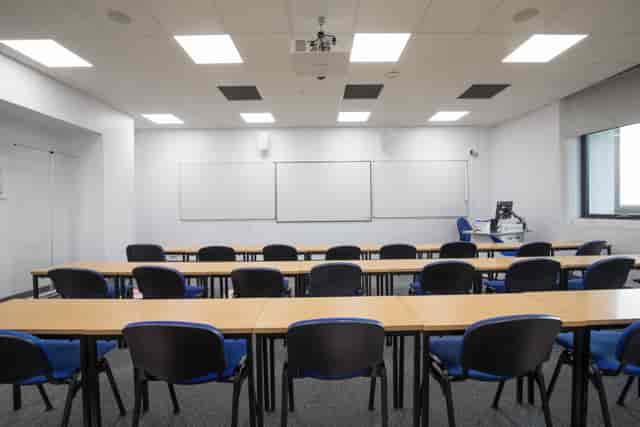 Classroom setup for training at University of West London, Ealing Campus, with whiteboards.