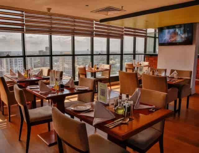 Ngorongoro Hall corporate breakfast setup with city views for business meetings and VIP lunches.