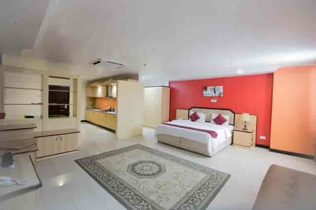Mayfair Hotel guest room with king bed for VIP event speakers and extended-stay delegates.