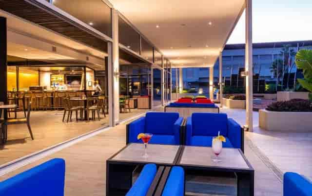 Le Studio event space with bar and terrace for evening networking mixers and welcome receptions.